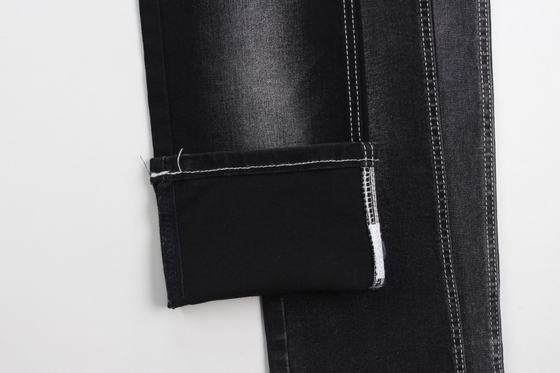 Sıcak satış 10 oz warp slub yüksek uzatma siyah arka tarafı kot pantolon için dokunmuş kot kumaş