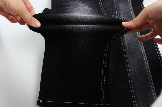 Sıcak satış 10 oz warp slub yüksek uzatma siyah arka tarafı kot pantolon için dokunmuş kot kumaş