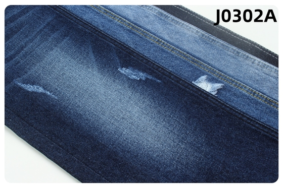13 oz sert, koyu mavi denim kumaş.