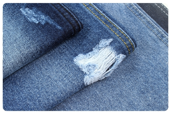 13 oz sert, koyu mavi denim kumaş.