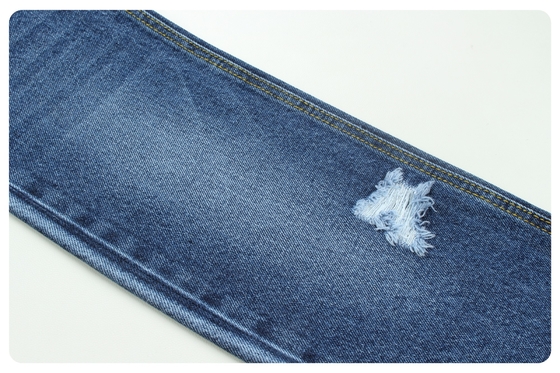 13 oz sert, koyu mavi denim kumaş.