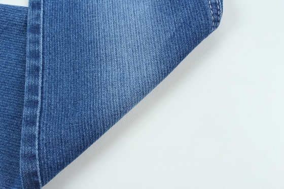 Özel sütten kesme 10.3 oz koyu mavi düşük germe kot pantolon kumaşı