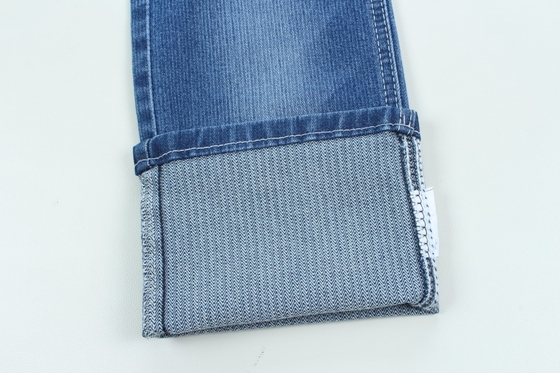 Özel sütten kesme 10.3 oz koyu mavi düşük germe kot pantolon kumaşı