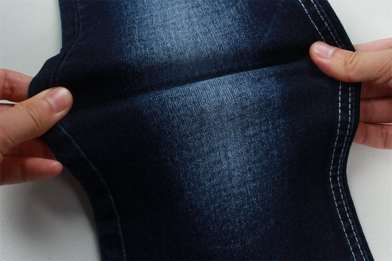 İyi fiyat 10.5 OZ Kadınlar için yüksek germelik denim kumaş Çin Guangdong'da üretilen kot pantolon kumaş çevrimiçi