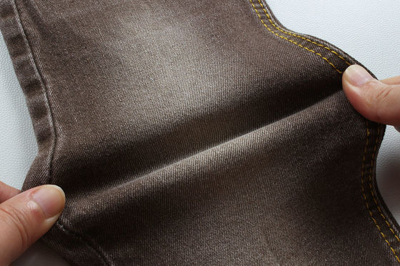 İyi fiyat Süper Kahverengi Stretch Denim Kumaş Kadınlar Erkek Jeans Düşük Stretch Rekabetçi Fiyat Çin Foshan Şehri çevrimiçi