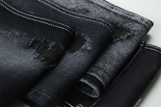 İyi fiyat 11.5oz Denim Kumaş Sert 56%C 44%P Siyah Ve Siyah Arka Taraf Marka Tarzı Jeans Erkek Arkadaşı Tarzı Yumuşak El Dokunuşu çevrimiçi